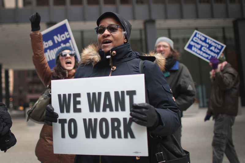 Government workers protest the government shutdown during a demonstration in the Federal Building Plaza on January 10, 2019 in Chicago, Illinois. The protest, on the 20th day of a partial shutdown, was one of several held around the country today.